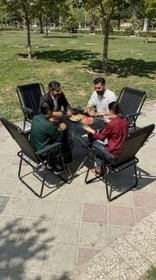 ست ۴ نفره صندلی تاشو مسافرتی با میز چوبی و ۷ فنر